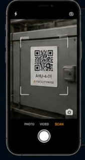 FacilityWISE mobile app scanning a QR code on equipment tag AHU-4-01